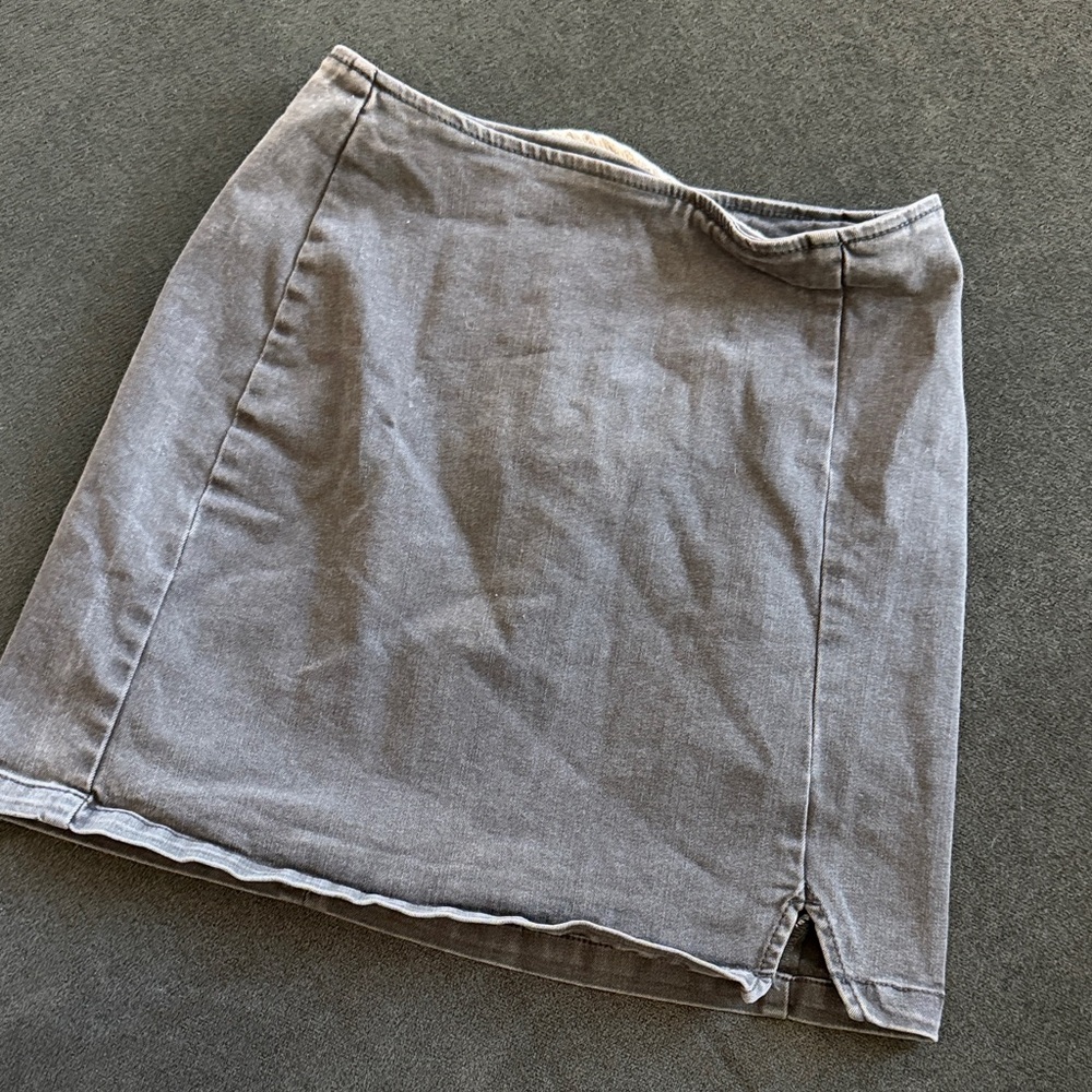 Faded black denim mini skirt